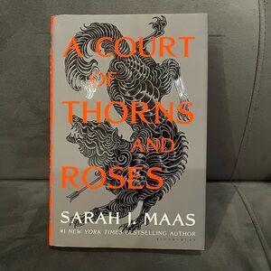 A Court of Thorns and Roses Hardcover Book by Sarah J. Maas